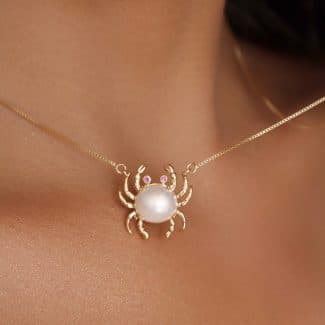 GARGANTILHA PEROLA CARANGUEJO COM OLHOS VERMELHOS 45CM