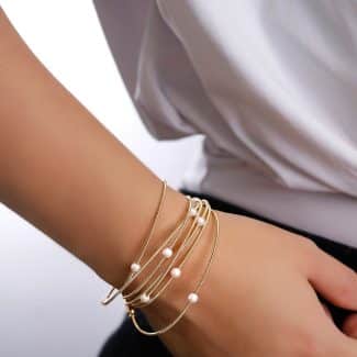 PULSEIRA LISA CORDA DE VIOLAO COM PEROLA