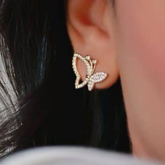 BRINCO ZIRCONIA BORBOLETA UM LADO VAZADO
